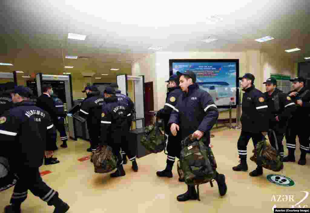 Rescue personnel are seen departing Azerbaijan on February 7. Baku has sent &quot;hundreds&quot; of search-and-rescue specialists, along with equipment, to Turkey.&nbsp;