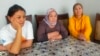 Gulfia Qazybek (left), Khalida Aqytkhan (center), and Gauhar Qurmanalieva were forced from a bus in Almaty on September 12. 