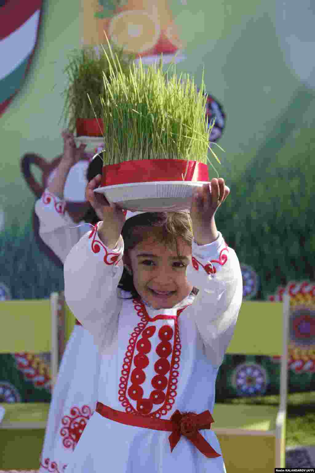 Another Tajik girl in Dushanbe marks the first day of spring.
