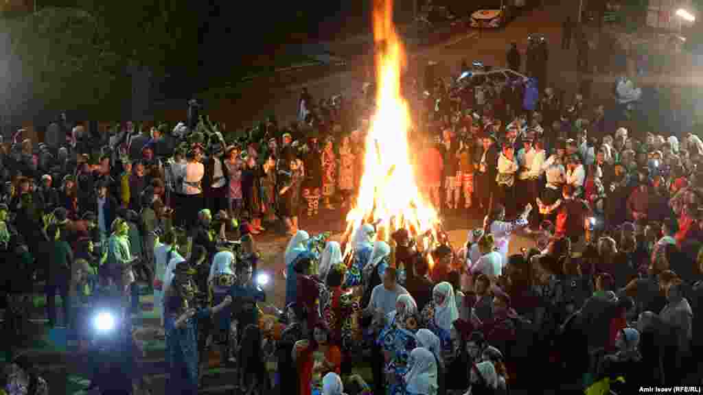 People dance and sing around a large bonfire in&nbsp;Dushanbe. &nbsp;