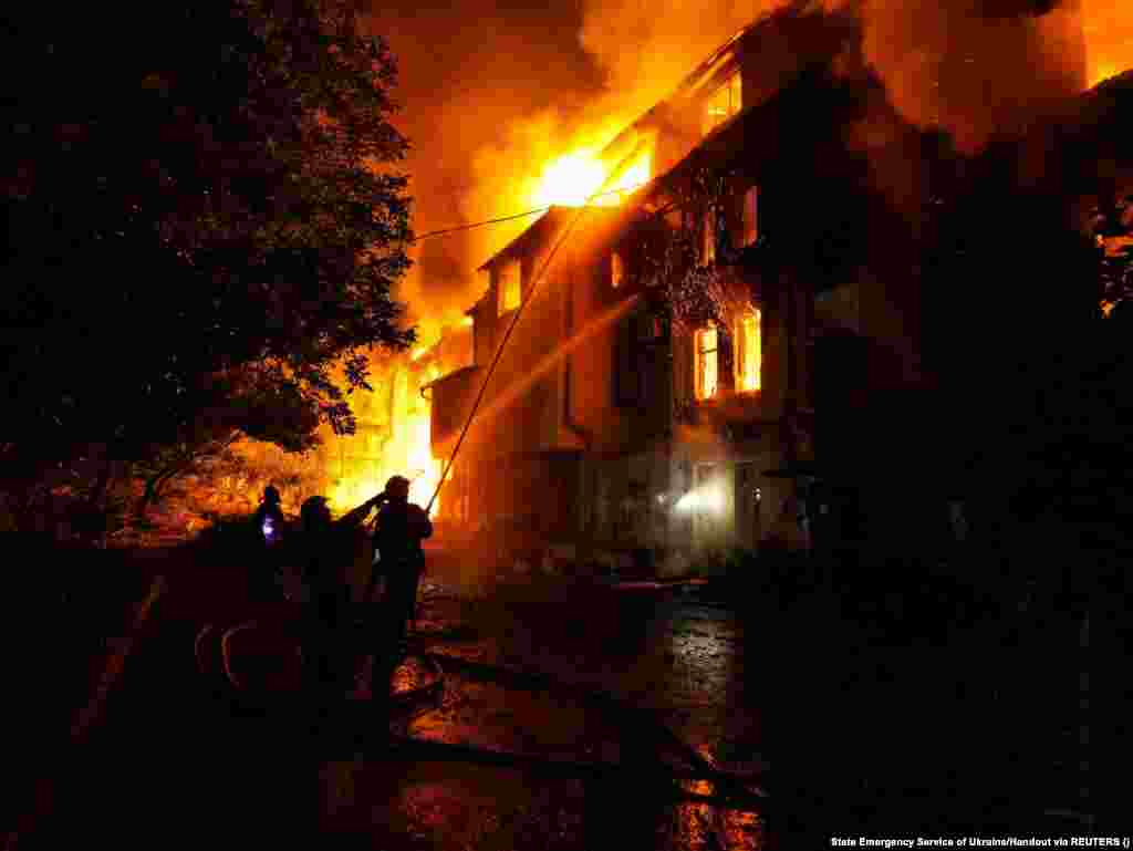 Firefighters worked throughout the early hours of July 20 to put out the blaze at the residential building in Mykolayiv.&nbsp;