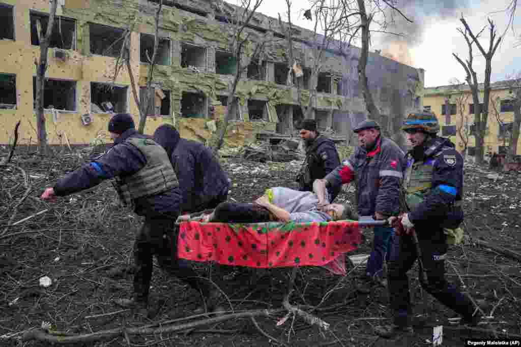 Iryna Kalinina, an injured pregnant woman, is carried from a maternity hospital that was damaged during a Russian air strike in Mariupol, Ukraine, on March 9, 2022. Her baby, named Miron (after the word for &quot;peace&quot;), was stillborn, and half an hour later Iryna died as well. World Press Photo of the Year: Mariupol Maternity Hospital Airstrike by&nbsp;Evgeniy Maloletka, AP
