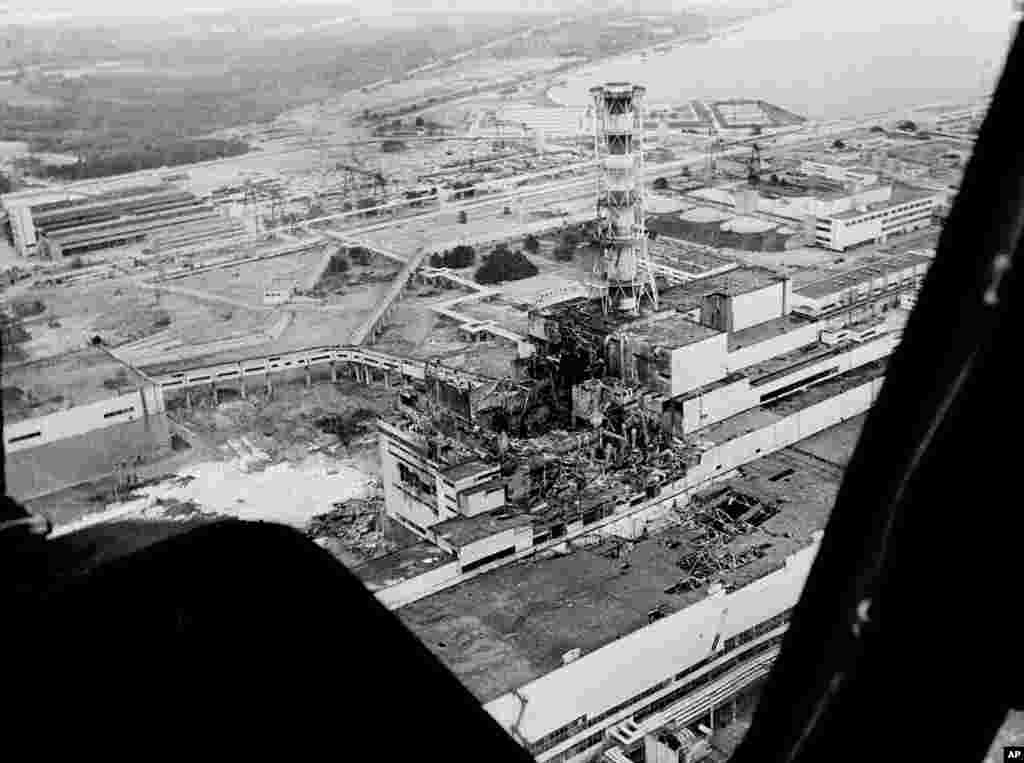An aerial view of the Chernobyl nuclear power plant in May 1986 shows the aftermath of the catastrophic explosion that spewed radioactive fallout into the atmosphere.&nbsp;The toxicity of the radioactive cloud was equivalent to 400 Hiroshima atomic explosions.