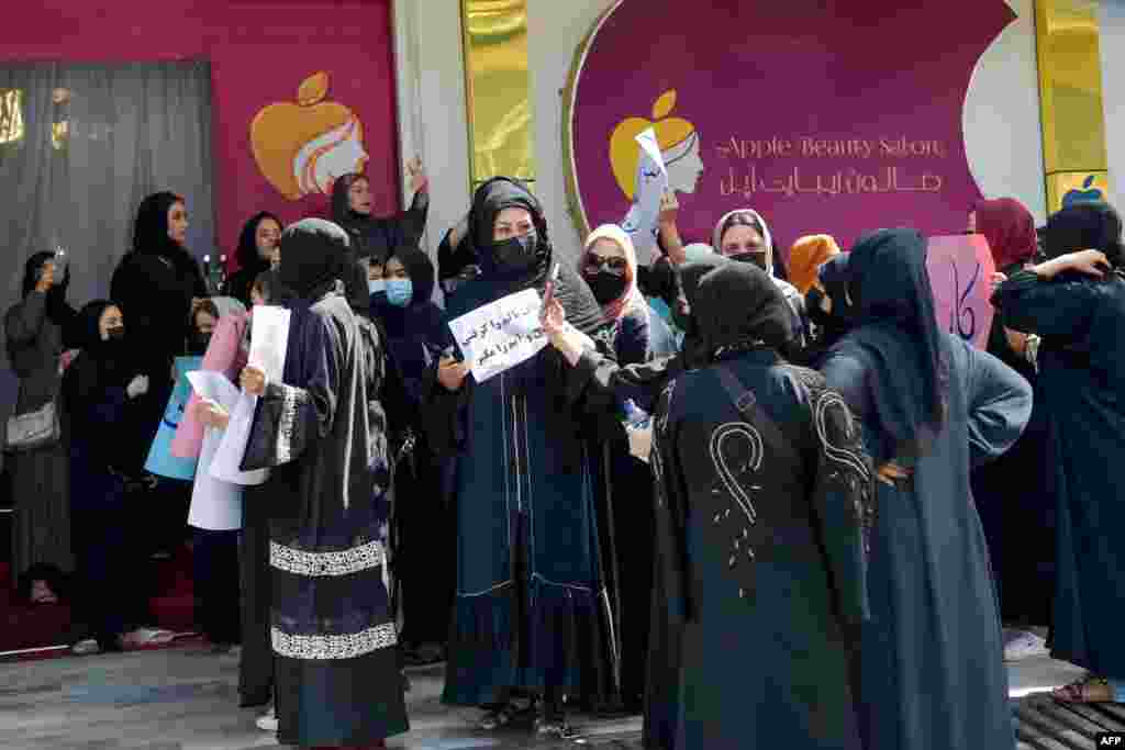 Afghan women stage a protest for their rights at a beauty salon in the Shahr-e-Naw area of Kabul on July 19. Afghanistan&#39;s Taliban authorities ordered beauty parlors across the country to shut, the latest curb to squeeze women out of public life.