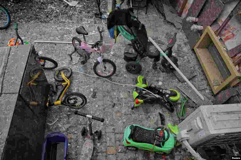 Children&#39;s bicycles are seen among debris at an apartment building damaged during Russian missile and drone strikes near Odesa, Ukraine.