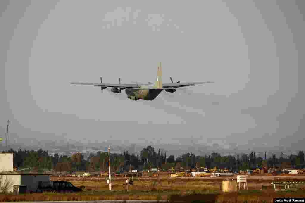 A Hellenic Air Force C-130 carrying members of a disaster response unit departs for Turkey from a military airport in Elefsina, Greece, on February 6. The aircraft carried 21 firefighters, two dogs, and heavy rescue equipment.&nbsp;