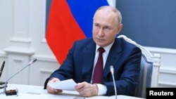 On July 21, Russian President Vladimir Putin accused Warsaw of harboring territorial ambitions in western Ukraine -- an oft-repeated claim by both Russia and Belarus. (file photo)