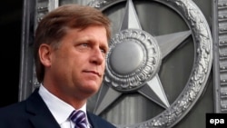 Then-U.S. Ambassador to Russia Michael McFaul leaves the Russian Foreign Ministry in Moscow in May 2013.