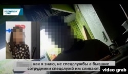 Aigul’s encounter with the agents was recorded. This screenshot from a video later published by an anonymous Facebook page shows her during their conversation.