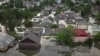 Homes in a flooded area of Ukraine’s Kherson region on June 7, a day after the Kakhovka dam was breached.