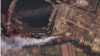 Smoke rises from fires near the Zaporizhzhya nuclear power plant in Enerhodar (center right) in this Planet Labs satellite image.